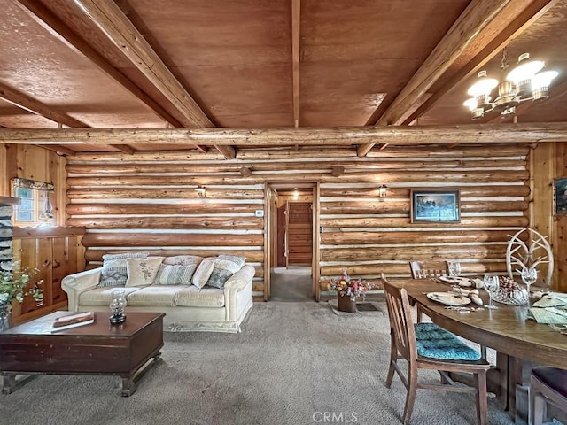 living room featuring carpet flooring, beam ceiling, rustic walls, and an inviting chandelier