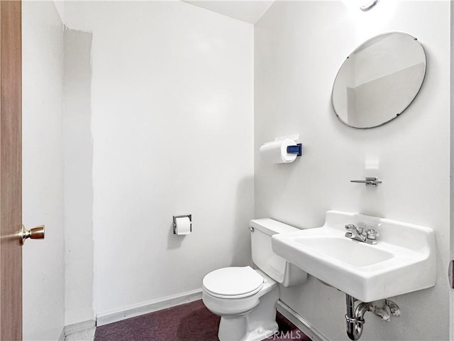 bathroom featuring toilet