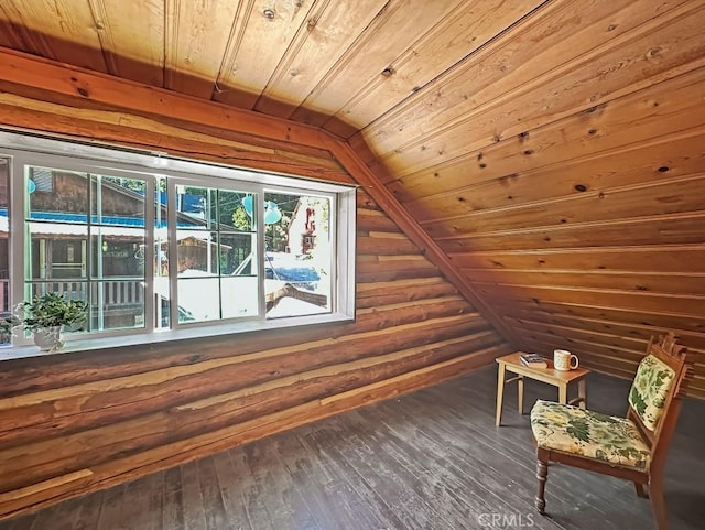 additional living space featuring dark hardwood / wood-style flooring, wood ceiling, and lofted ceiling