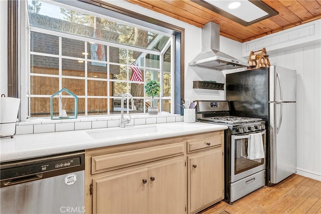 kitchen with sink, appliances with stainless steel finishes, ventilation hood, wooden ceiling, and light wood-type flooring