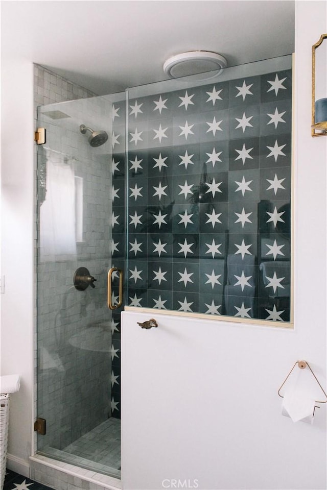 bathroom with an enclosed shower