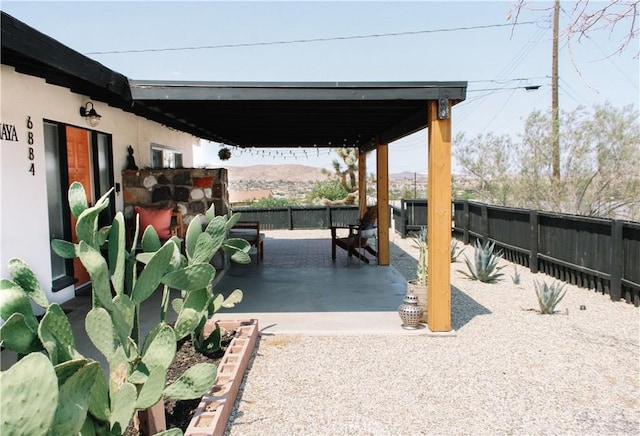 view of patio featuring a mountain view