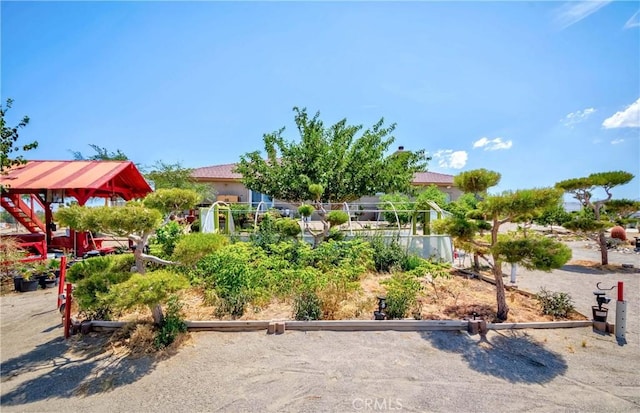 view of property's community featuring fence