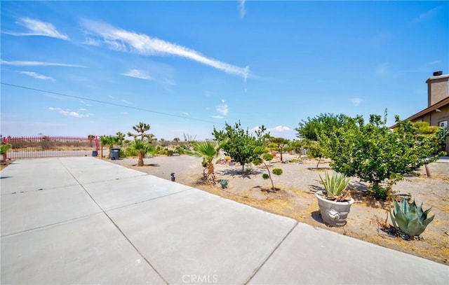 view of patio / terrace featuring fence