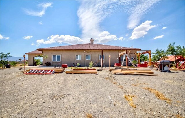 view of front of house featuring a patio area