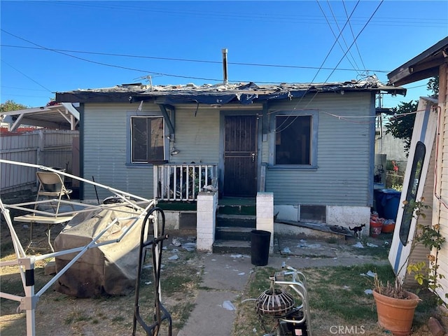 view of front of home with fence