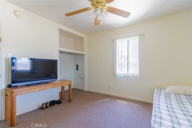 carpeted bedroom featuring ceiling fan