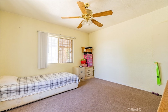 bedroom with light carpet and ceiling fan