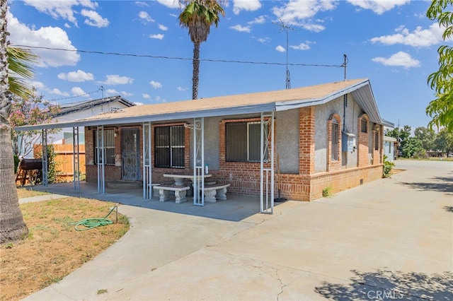 view of front of home with a patio area