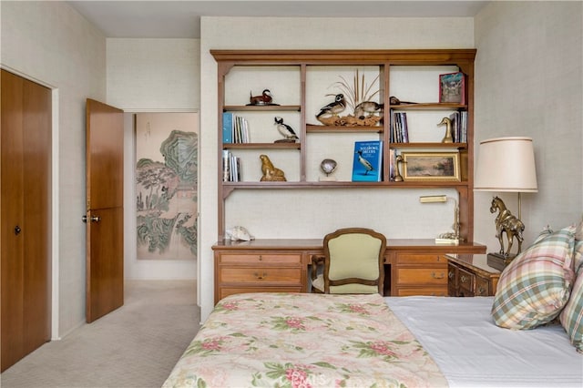 bedroom featuring light colored carpet