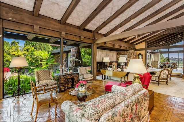 sunroom featuring lofted ceiling with beams