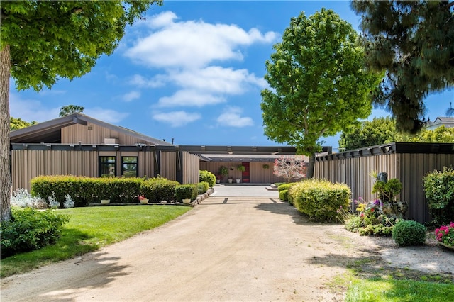 view of front of property with a front lawn