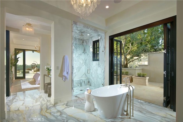 bathroom with an inviting chandelier and plus walk in shower