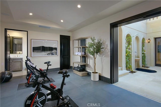 exercise area featuring lofted ceiling