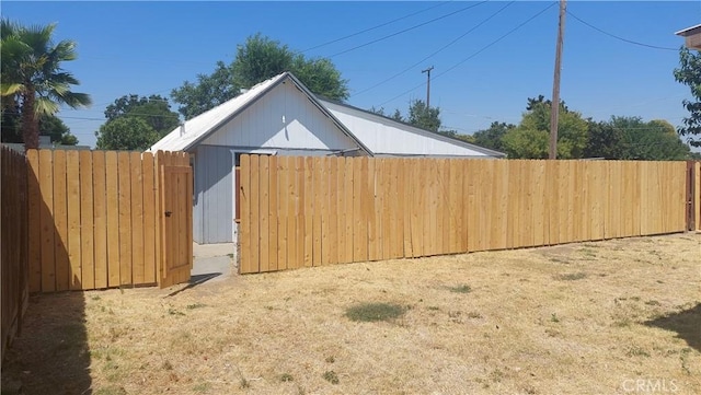 view of yard featuring a fenced backyard