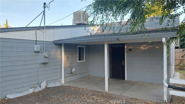 view of property exterior featuring a patio area