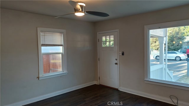 entryway featuring dark hardwood / wood-style floors and ceiling fan