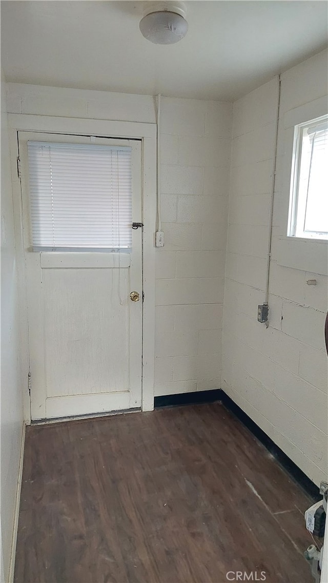 spare room featuring dark hardwood / wood-style flooring