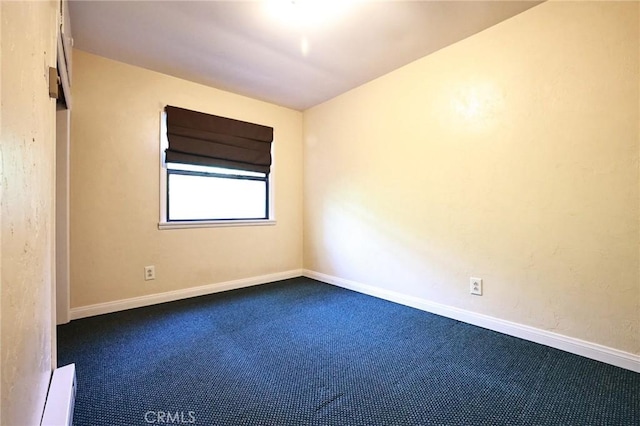 empty room featuring carpet floors