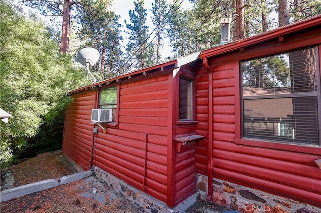 view of home's exterior with cooling unit