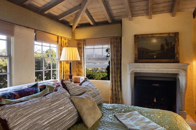 bedroom with beam ceiling and wooden ceiling