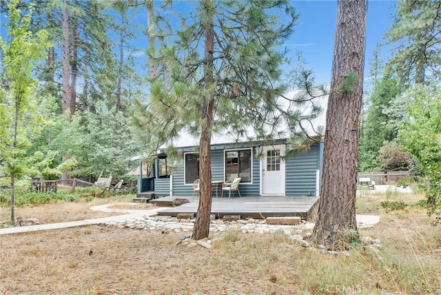 view of front of house with a wooden deck