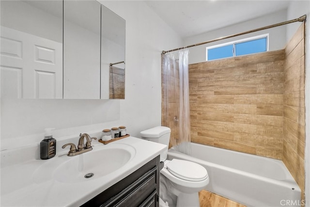 full bathroom with shower / bath combo with shower curtain, wood-type flooring, toilet, and vanity