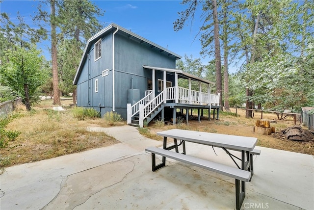 back of house with a patio area