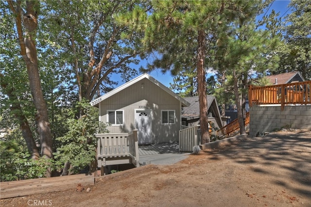 view of front of home with a deck