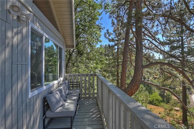 wooden balcony featuring a wooden deck