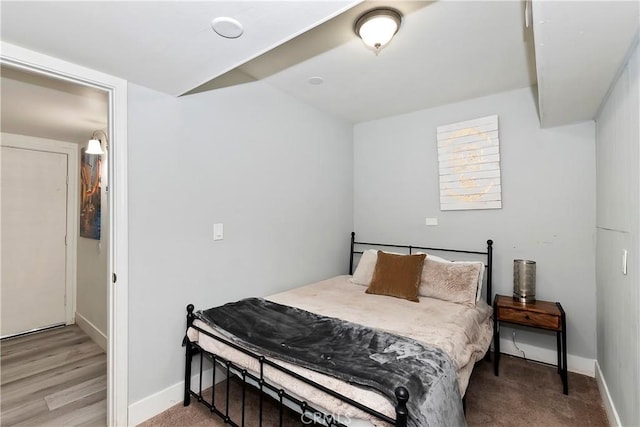 bedroom featuring lofted ceiling