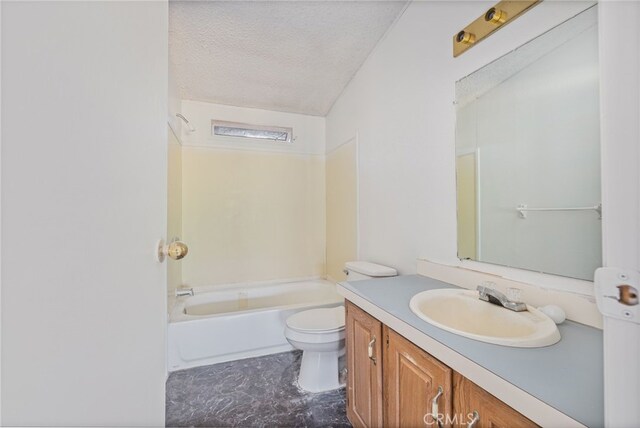 full bathroom featuring vanity, shower / washtub combination, toilet, and a textured ceiling