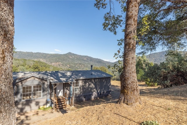 exterior space featuring a mountain view