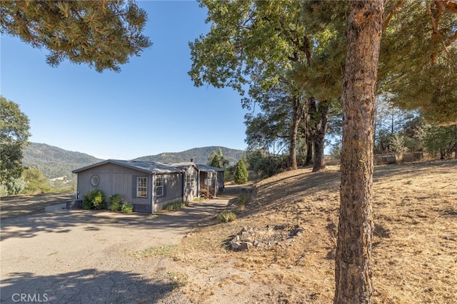 exterior space featuring a mountain view