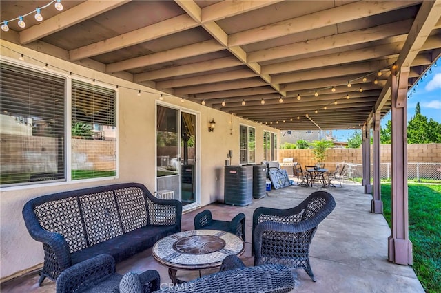 view of terrace with central AC unit and an outdoor hangout area