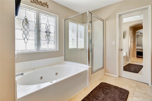 bathroom with tile floors and plus walk in shower