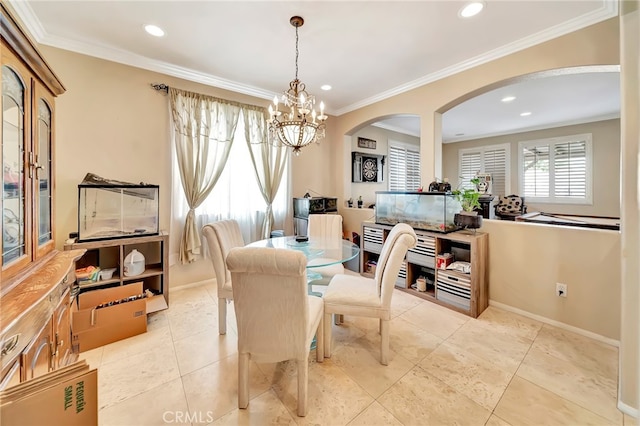 dining room with crown molding, light tile flooring, and a notable chandelier