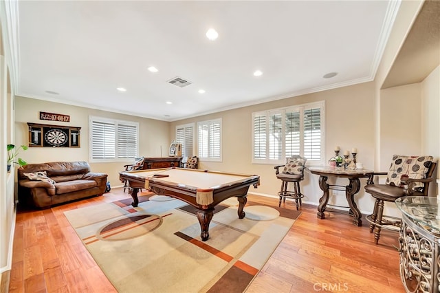 game room featuring crown molding, light wood-type flooring, and billiards