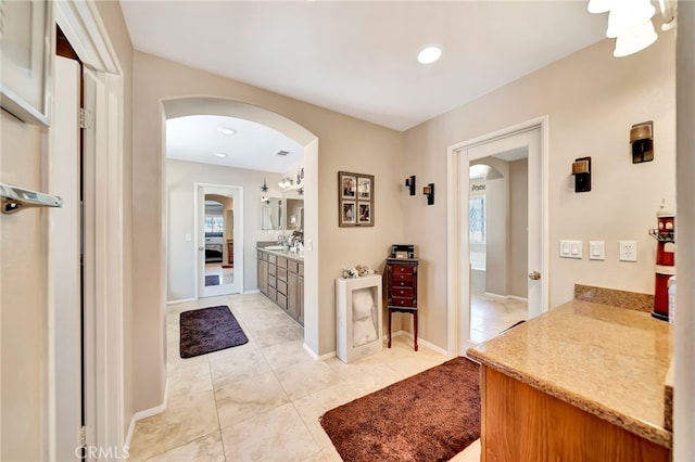 interior space featuring light tile flooring