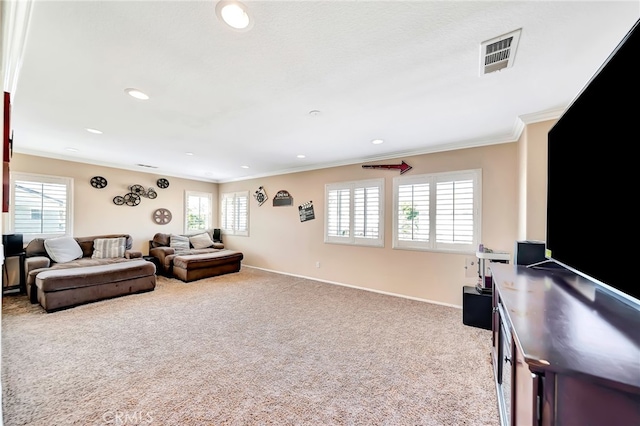 carpeted living room featuring crown molding