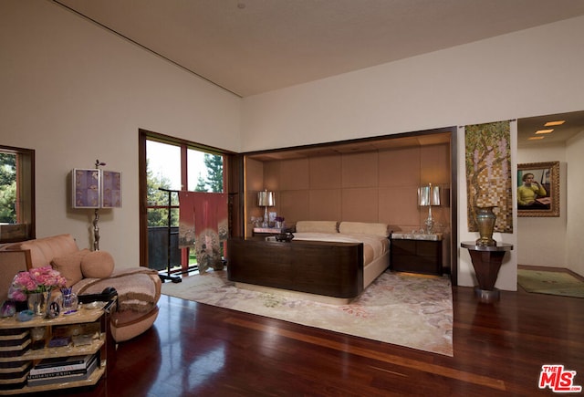 bedroom featuring hardwood / wood-style floors