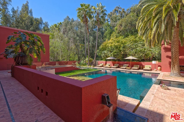 view of pool with a patio