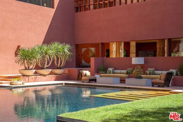 view of pool featuring an outdoor hangout area