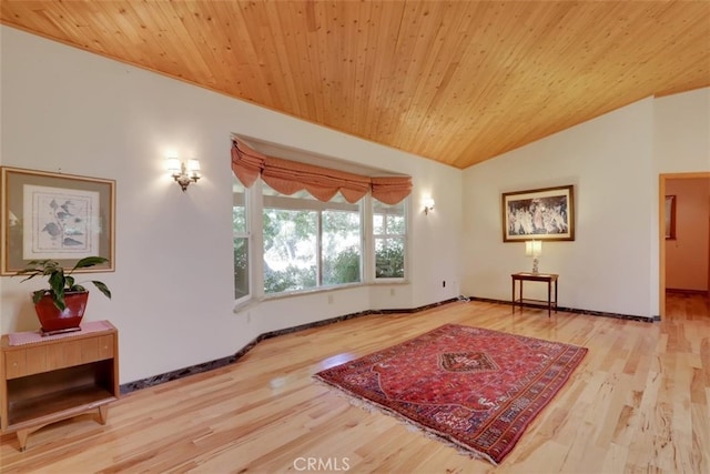 interior space featuring wood ceiling, lofted ceiling, and hardwood / wood-style floors