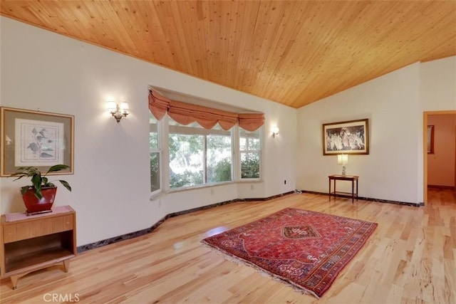 living room featuring baseboards, wooden ceiling, wood finished floors, and lofted ceiling