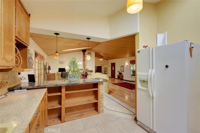 kitchen with white fridge with ice dispenser, light tile patterned floors, open floor plan, open shelves, and lofted ceiling