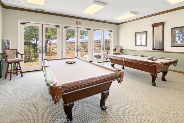 game room featuring pool table, ornamental molding, light carpet, and french doors