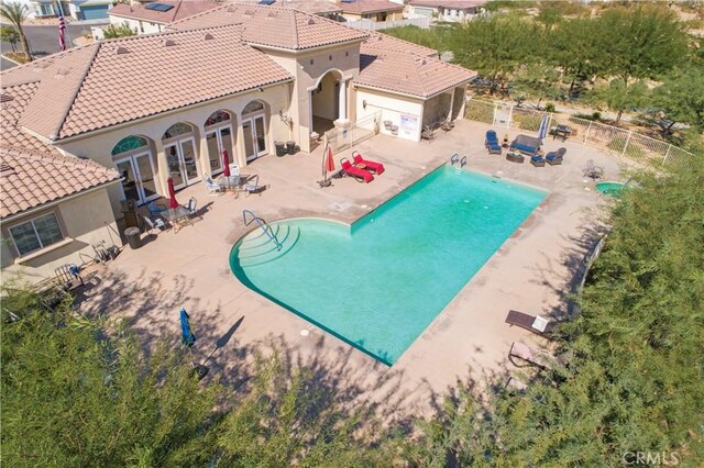 view of pool featuring a patio