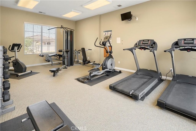 workout area with light colored carpet