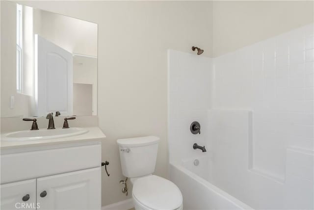 full bathroom featuring tub / shower combination, toilet, and vanity